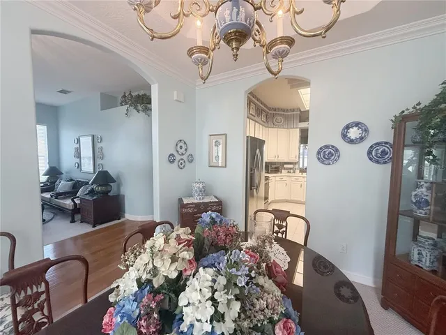 a view of a chairs and table in the patio