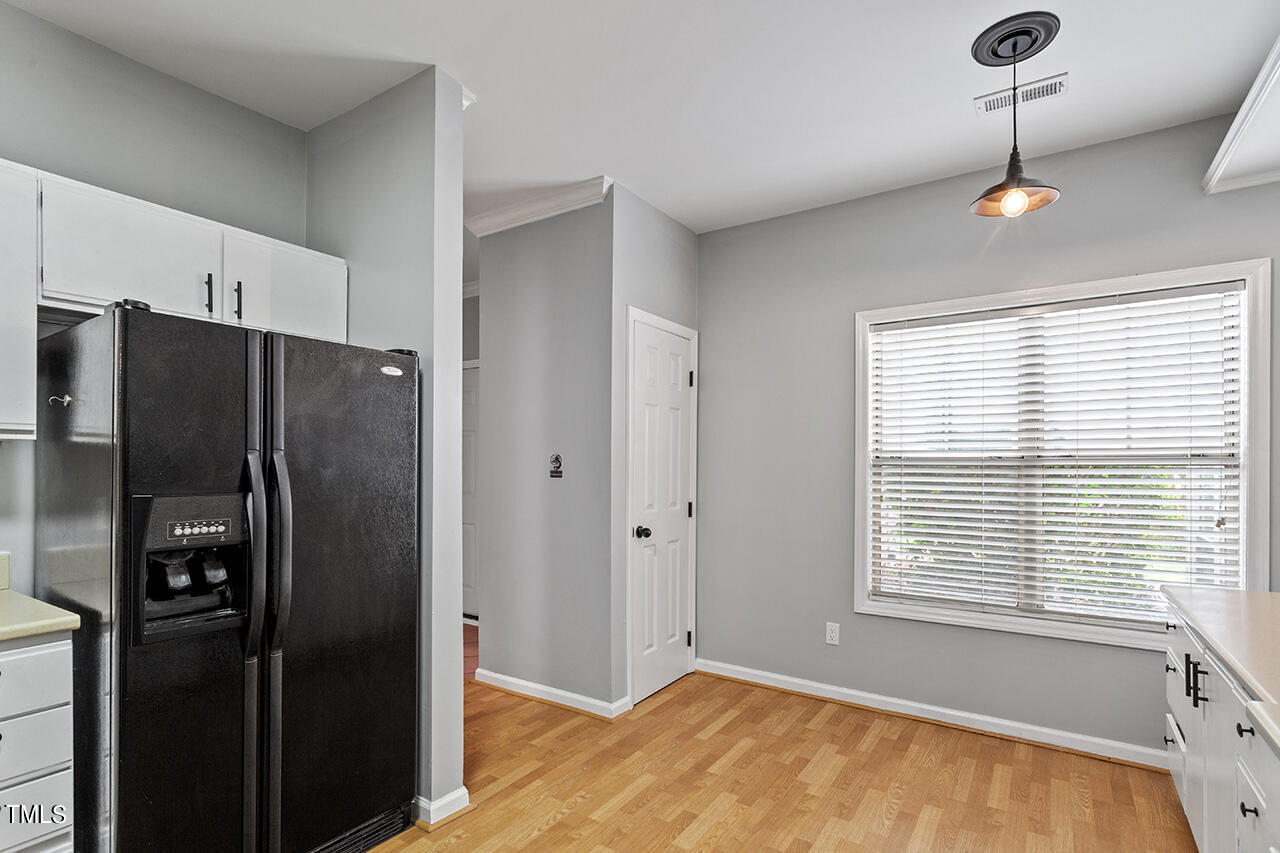6011 Winterpointe Lane, Unit 104 Raleigh, NC 27606 - Photo 11 of 31 a view of an empty room with a window