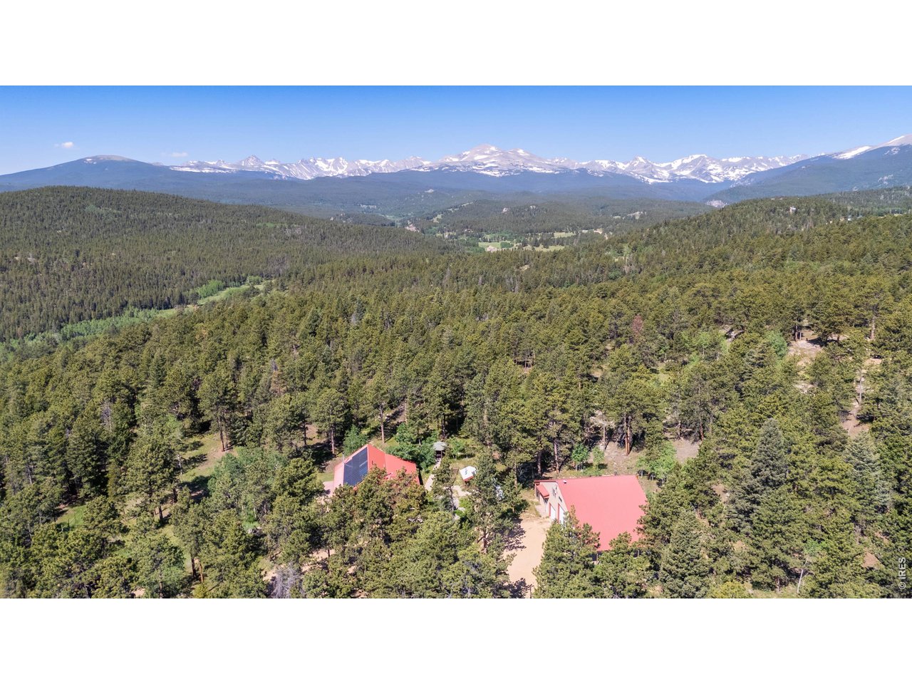 a outdoor view with mountains in the background