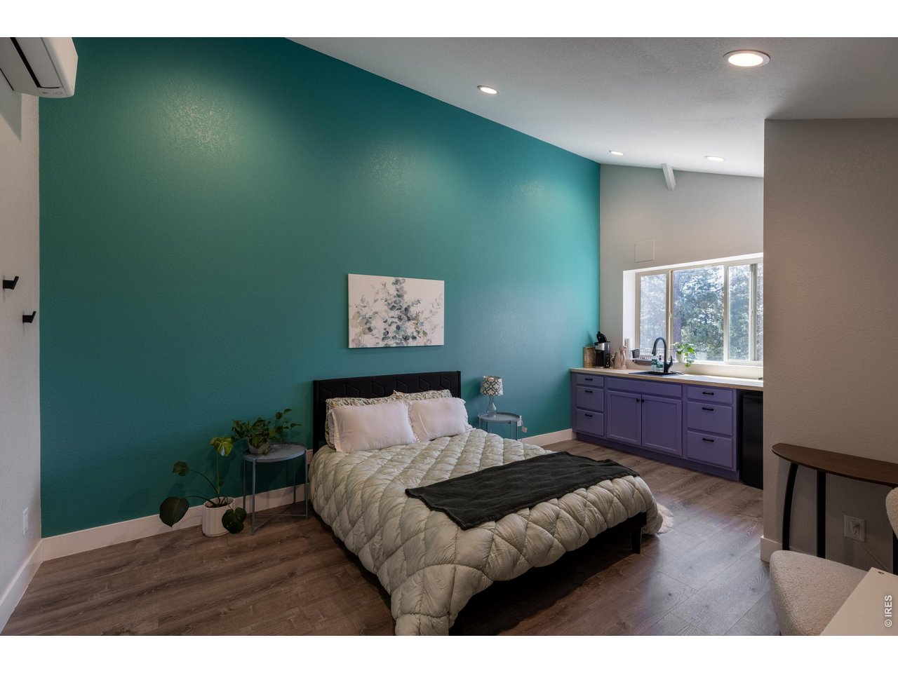 187 Lynx Drive Ward, CO 80481 - Photo 21 of 50 a bedroom with a bed and a dresser