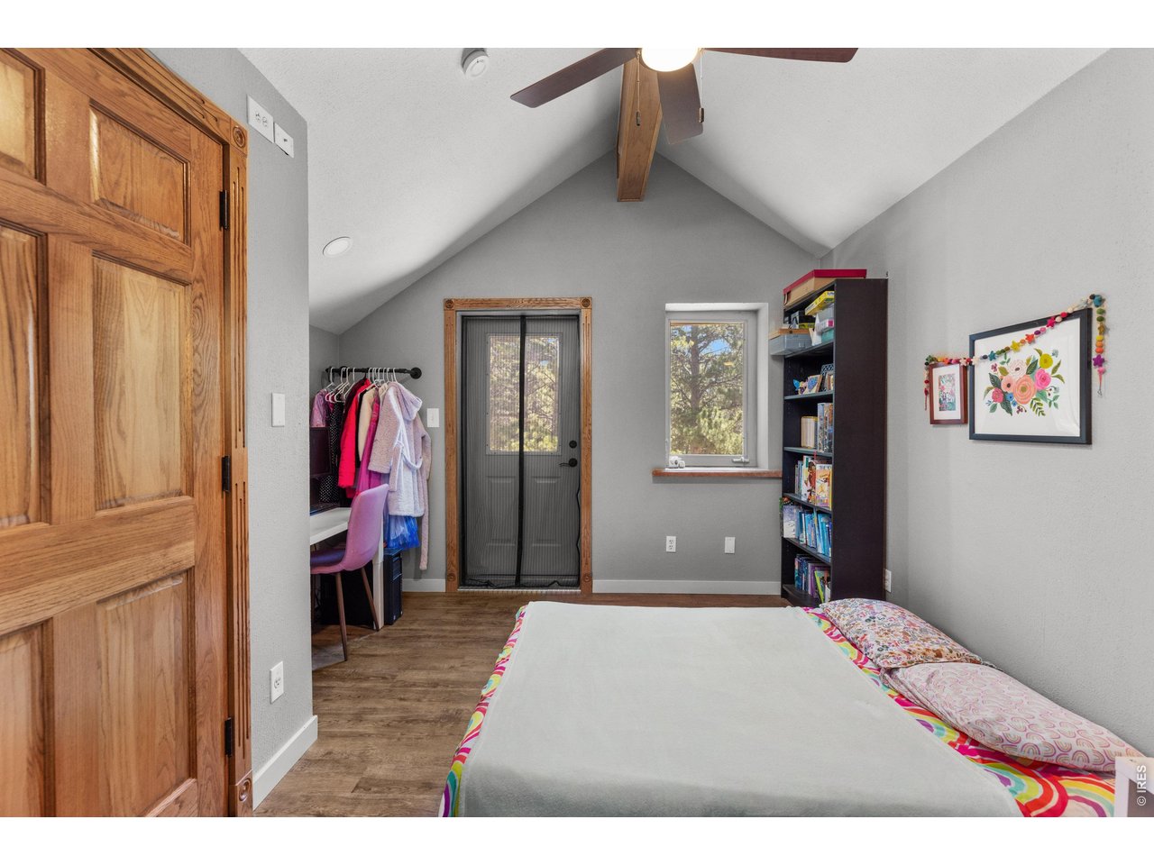187 Lynx Drive Ward, CO 80481 - Photo 24 of 50 a bedroom with a bed and a closet