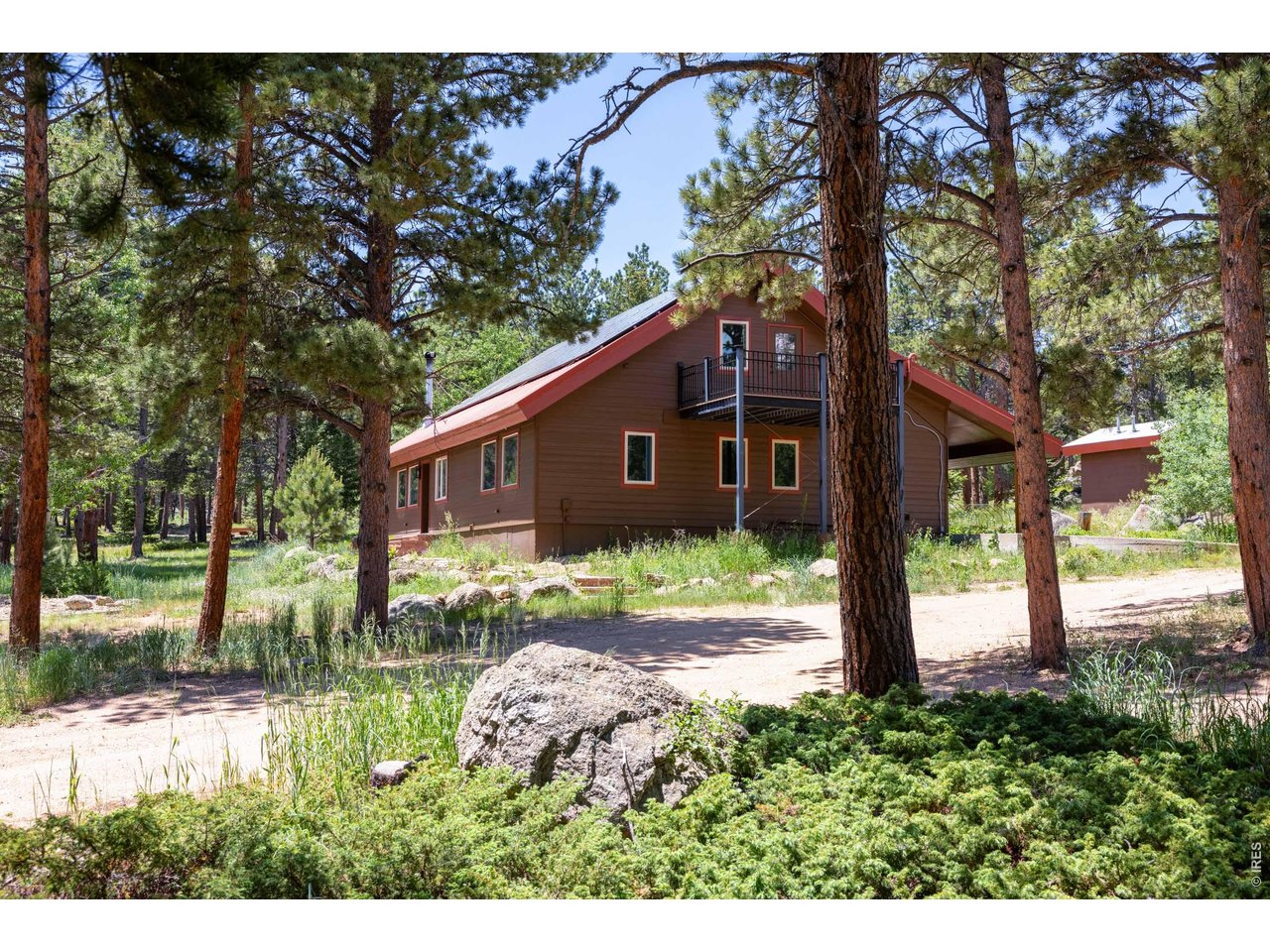 187 Lynx Drive Ward, CO 80481 - Photo 5 of 50 a house view with a garden space