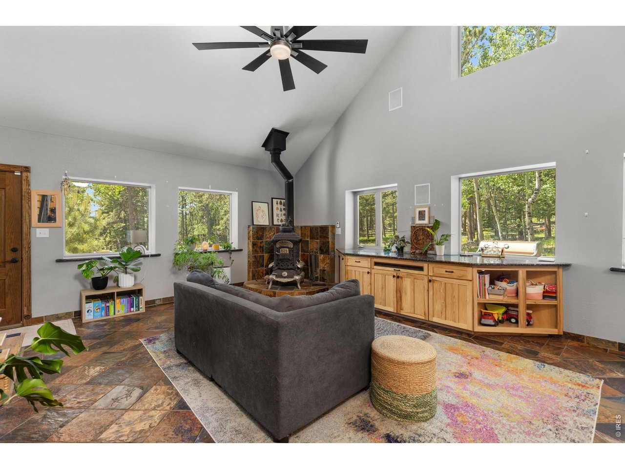 187 Lynx Drive Ward, CO 80481 - Photo 8 of 50 a living room with furniture and a large window