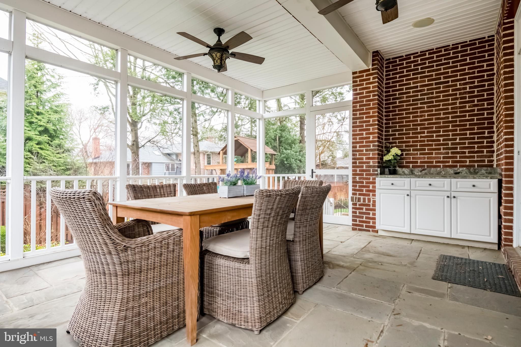 8603 Rayburn Road Bethesda, MD 20817 - Photo 24 of 67 Relax and dine on the flagstone screened-in porch