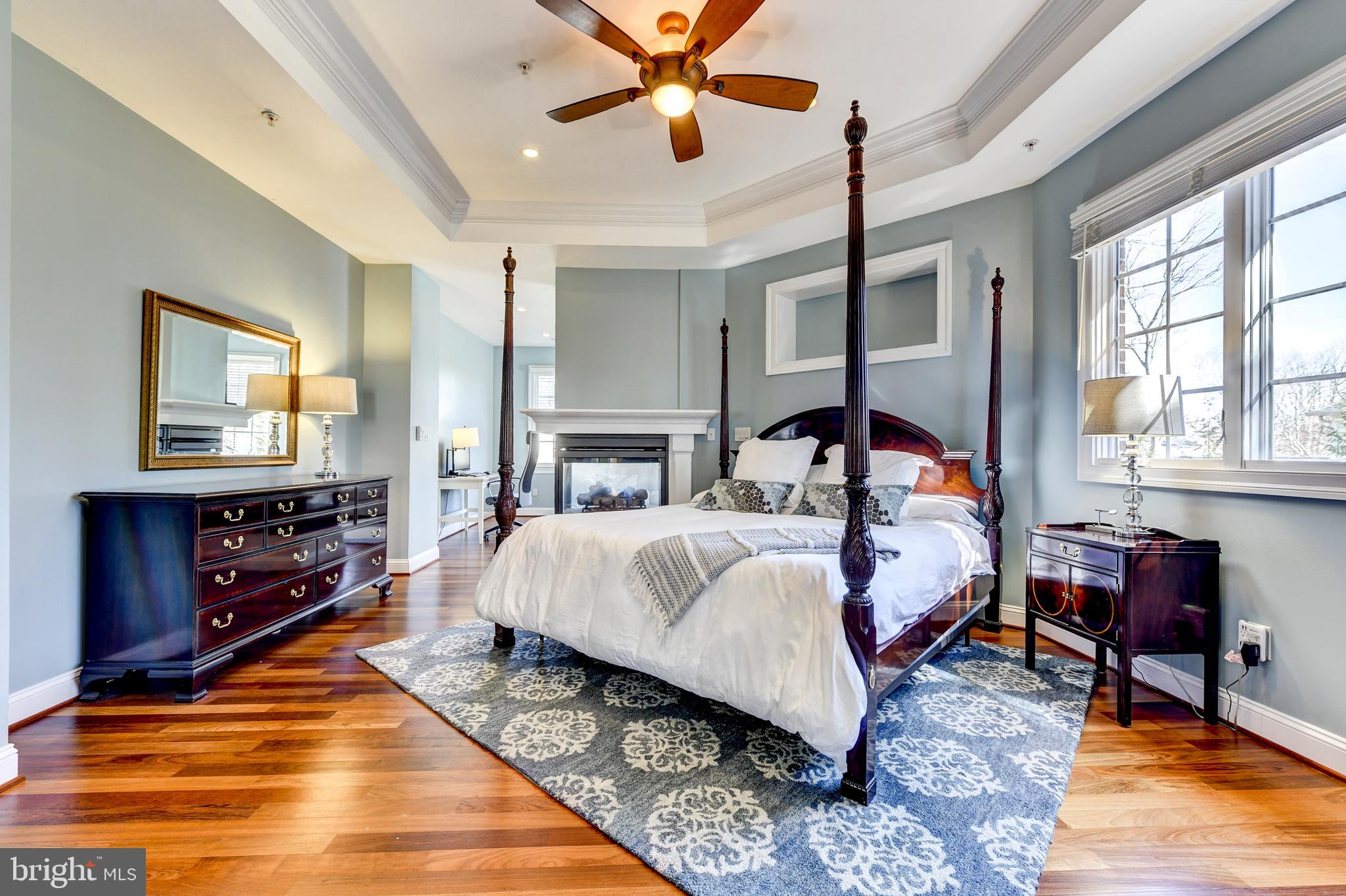 8603 Rayburn Road Bethesda, MD 20817 - Photo 27 of 67 Owner's suite with 3-sided gas fireplace