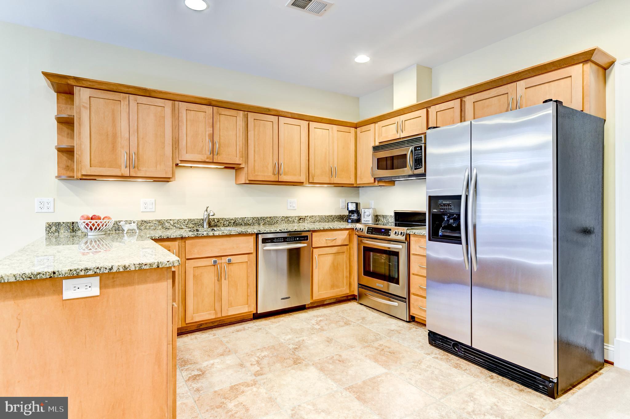 8603 Rayburn Road Bethesda, MD 20817 - Photo 54 of 67 Full lower level kitchen with granite