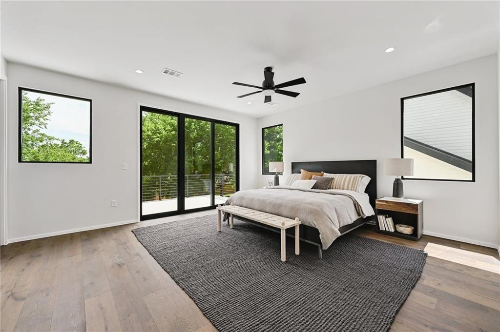 1904 Collier Street Austin, TX 78704 - Photo 20 of 31 a bed sitting in a spacious bedroom next to a window