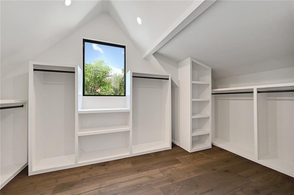 1904 Collier Street Austin, TX 78704 - Photo 24 of 31 an empty room with wooden floor closet and windows