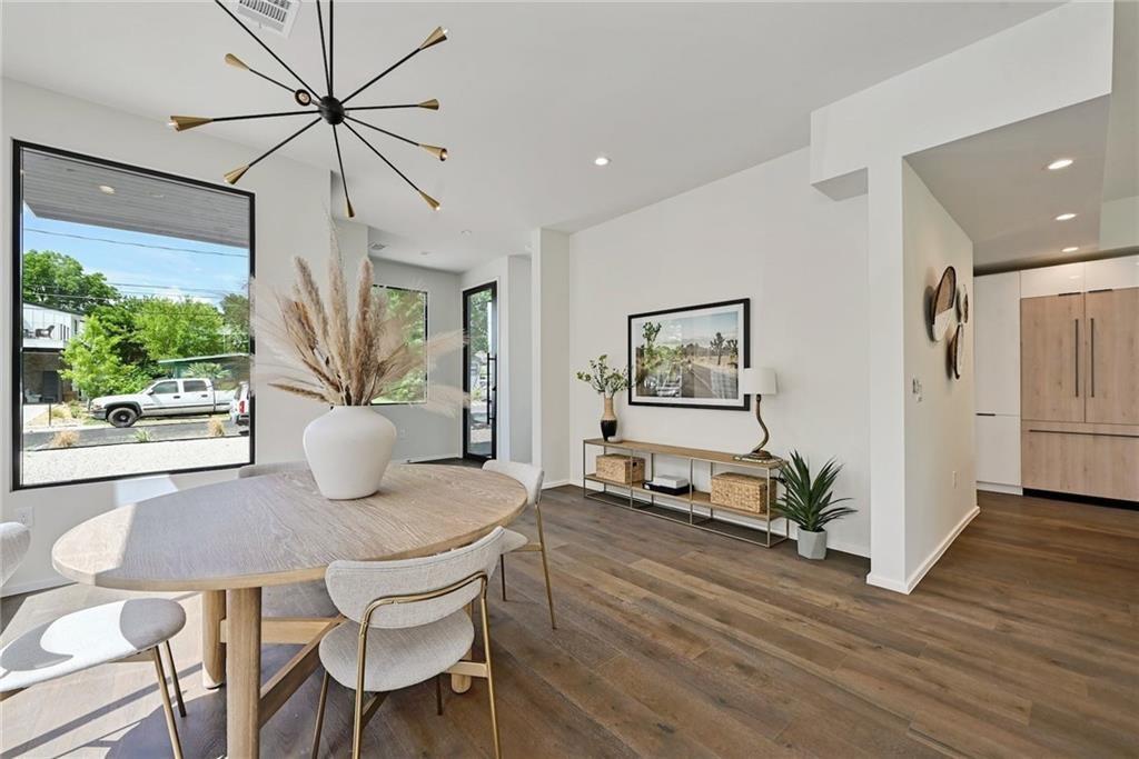 1904 Collier Street Austin, TX 78704 - Photo 7 of 31 a view of a dining room with furniture window and wooden floor