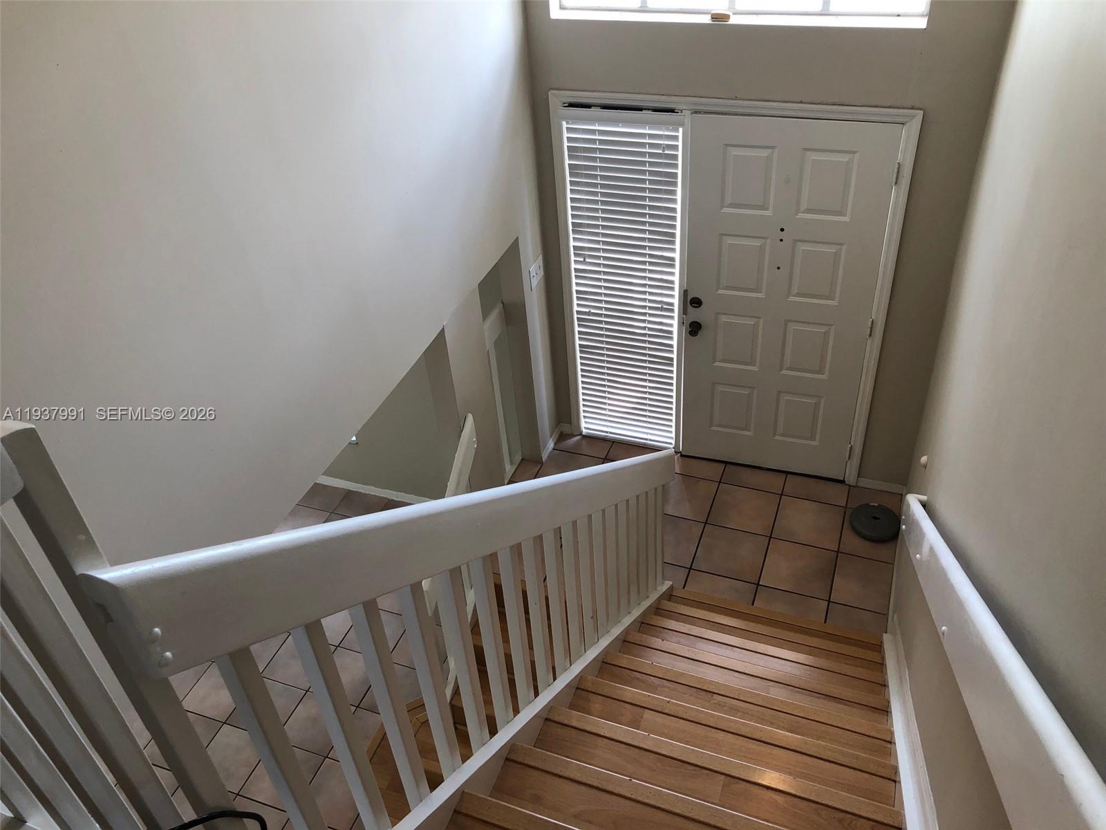 11274 Southwest 64th Lane Miami, FL 33173 - Photo 17 of 34 a view of a balcony with wooden floor