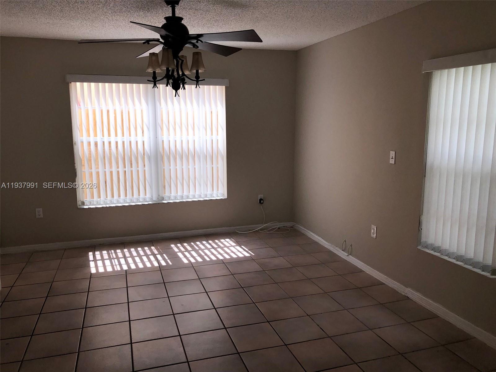 11274 Southwest 64th Lane Miami, FL 33173 - Photo 18 of 34 a view of an empty room and window