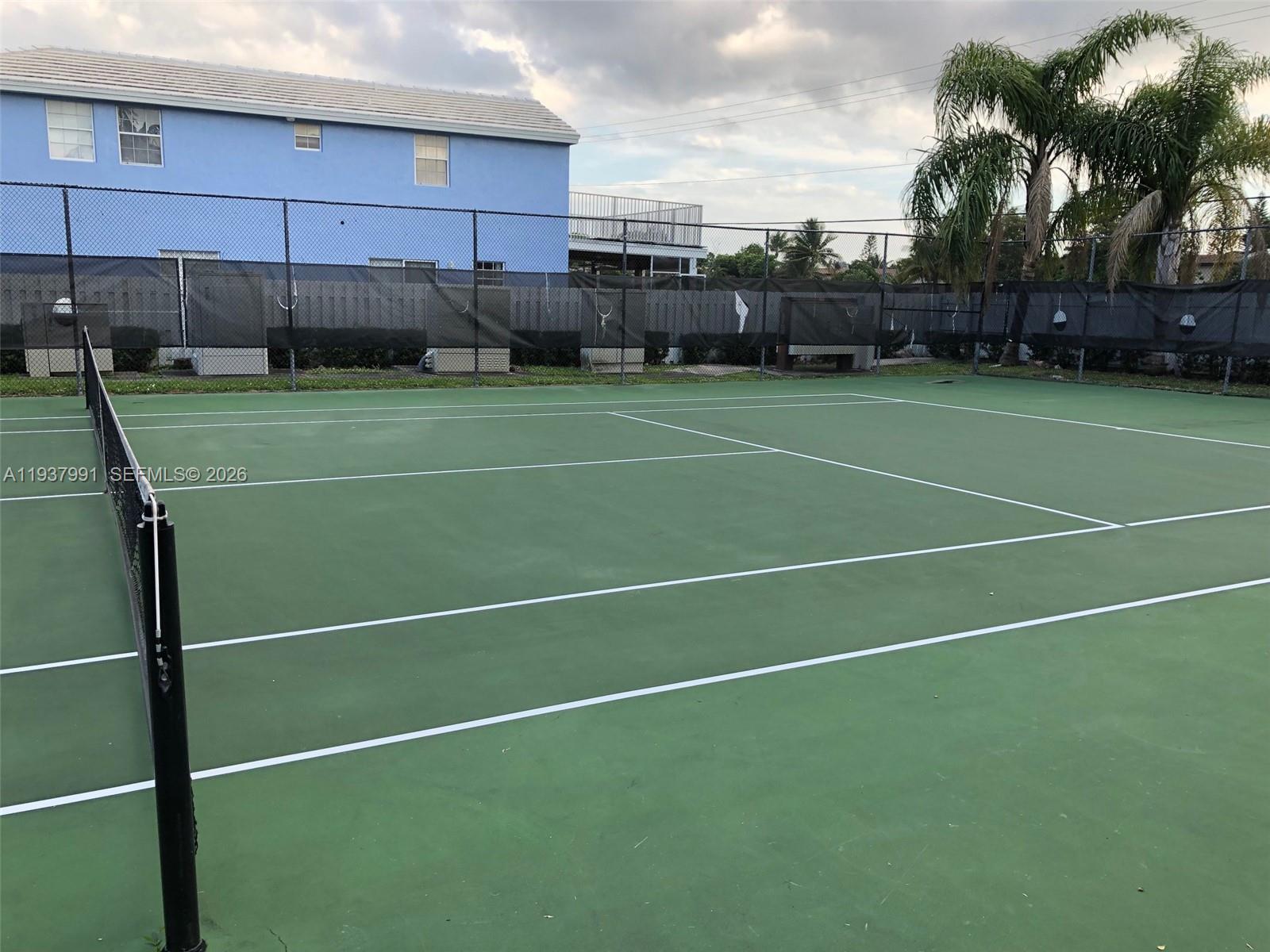 11274 Southwest 64th Lane Miami, FL 33173 - Photo 31 of 34 a view of a tennis court