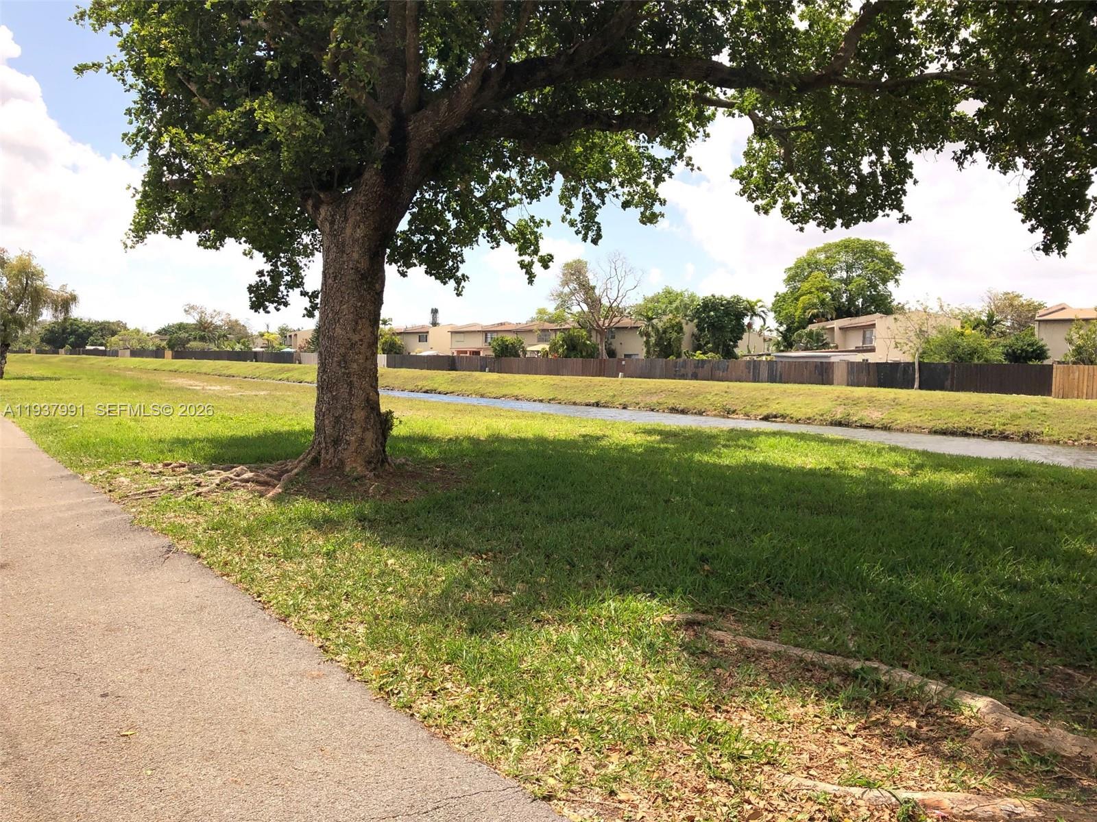 11274 Southwest 64th Lane Miami, FL 33173 - Photo 32 of 34 a view of an outdoor space and a lake view