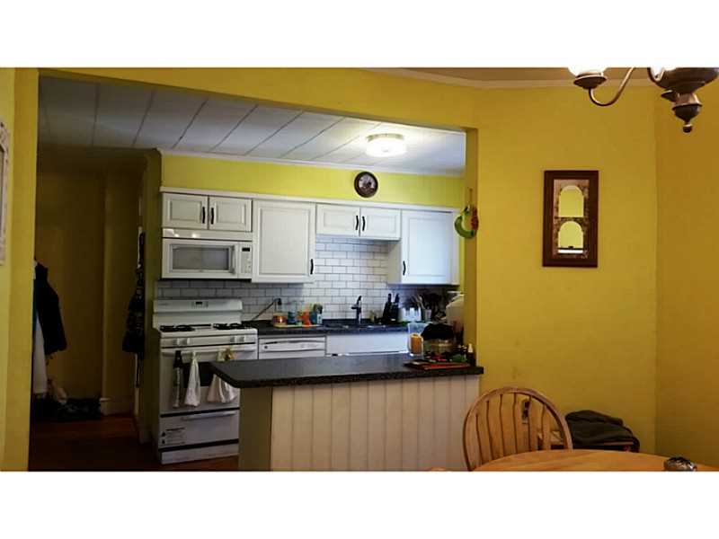 30 Maple Street Woonsocket, RI 02895 - Photo 20 of 24 Kitchen. Right Side - 2nd Flr Apt - Dining Room To Kitchen