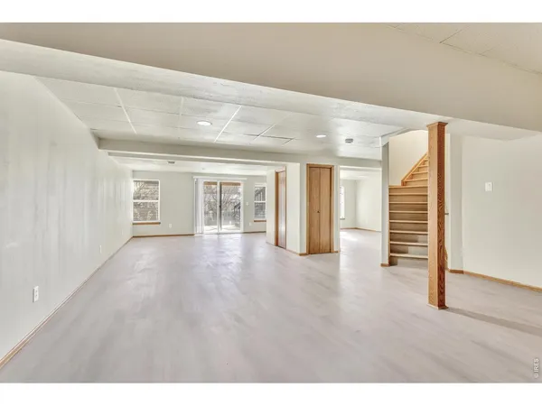 a view of a livingroom with wooden floor