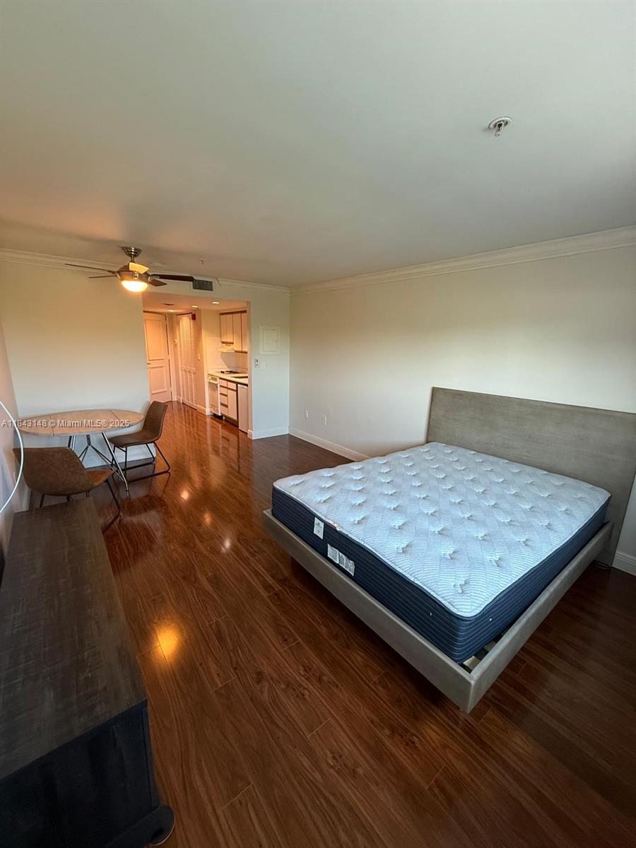 5715 Southwest 72nd Street, Unit 5715 South Miami, FL 33143 - Photo 2 of 6 a room with pool table and a couch