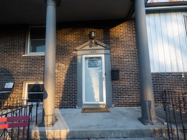 a front view of a house with windows