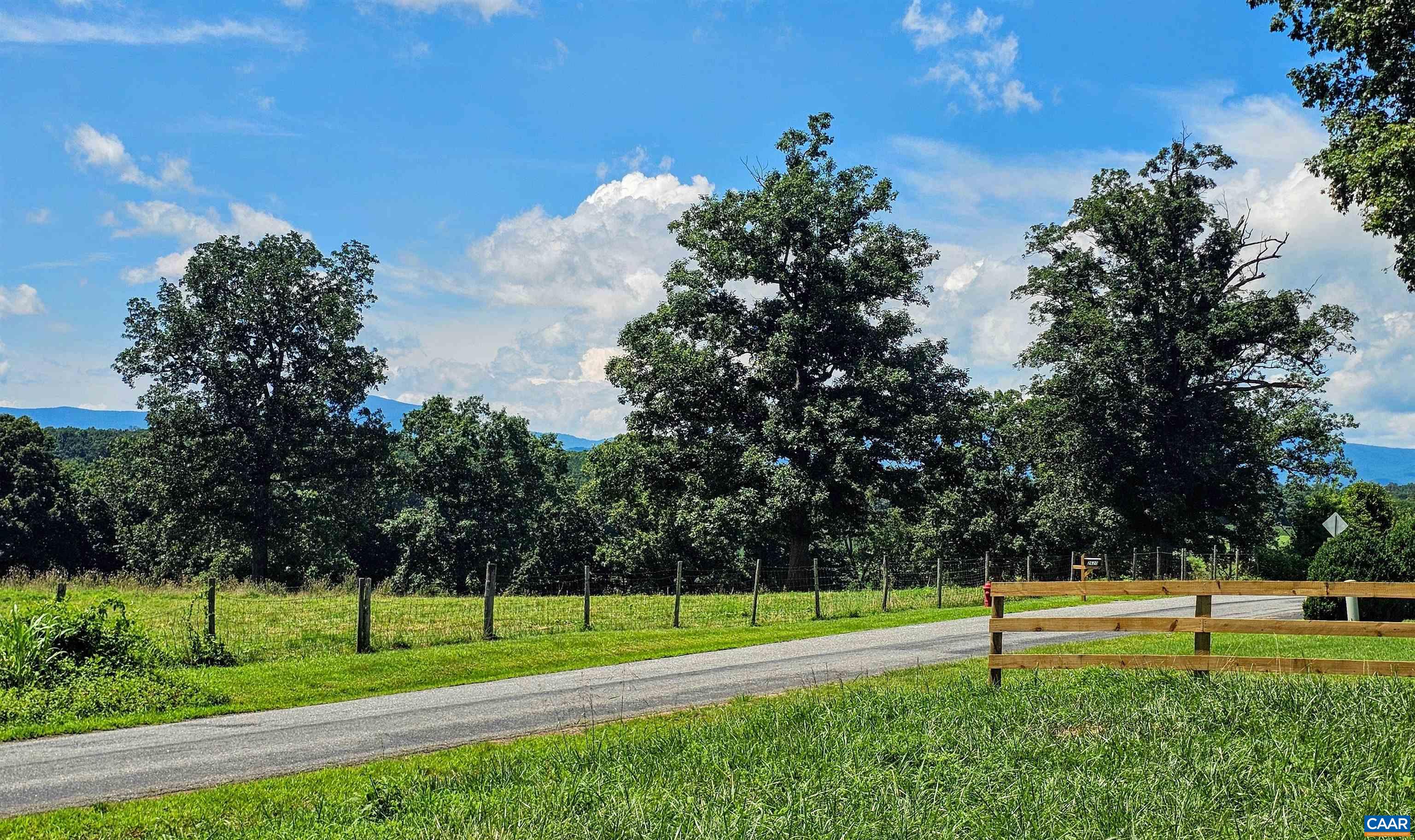 Lot B8 Moore Road Ruckersville, VA 22968 - Photo 2 of 7 a view of a park with houses in the background