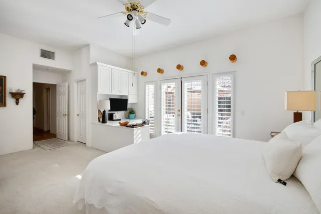 a bed room with a bed furniture and a window