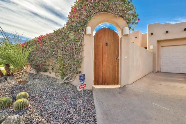 a view of a backyard with patio