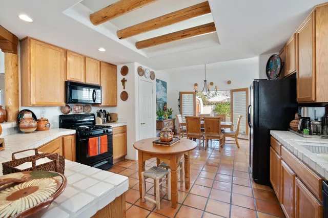 a bedroom with furniture and a fireplace