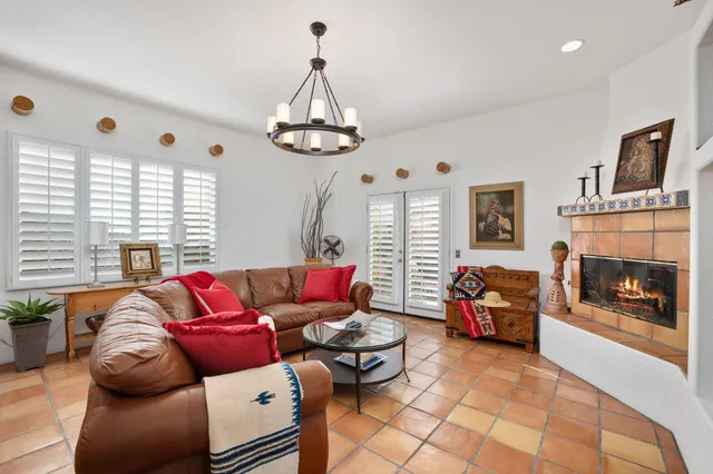 a view of an outdoor sitting area with furniture