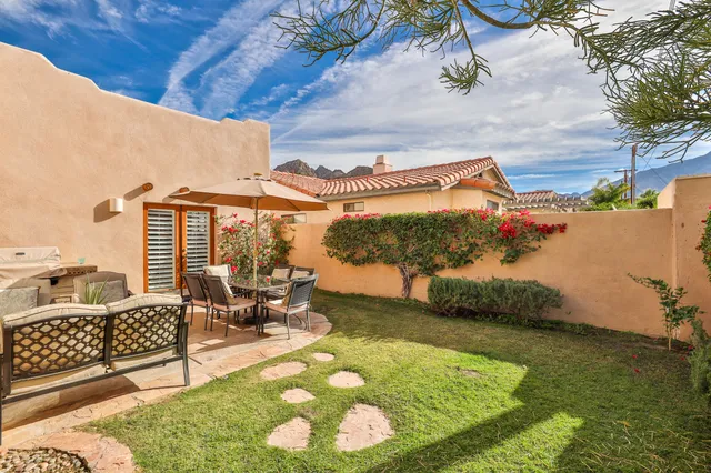 a view of multiple houses with a outdoor space