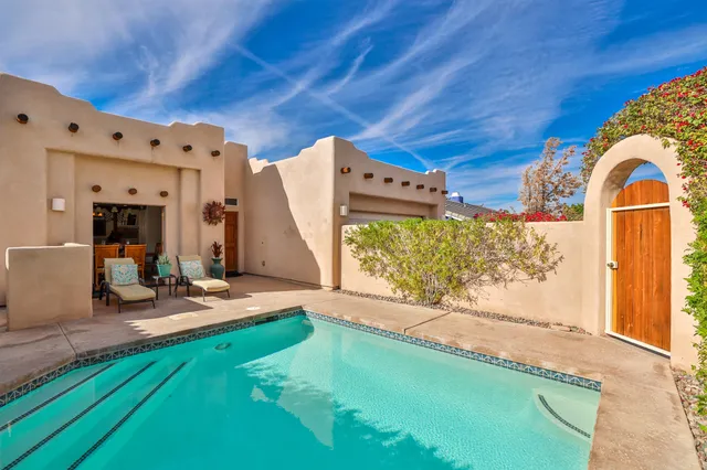 a view of a bathroom with sink and garden