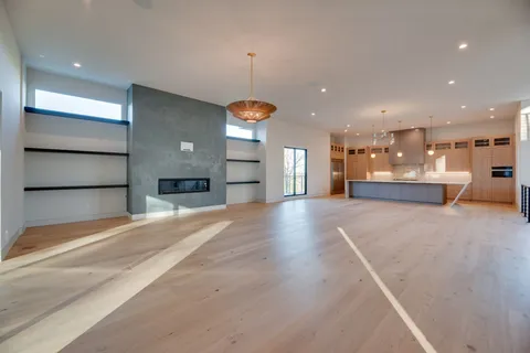 a view of a kitchen with a sink and a stove