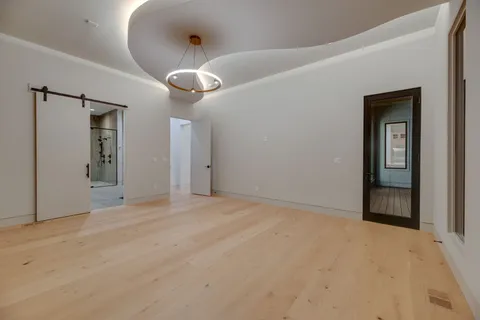 a bathroom with a bathtub and shower