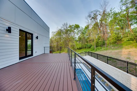 a view of a balcony with an outdoor space