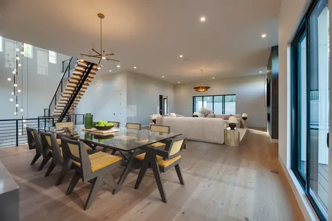 a workspace with furniture and a chandelier