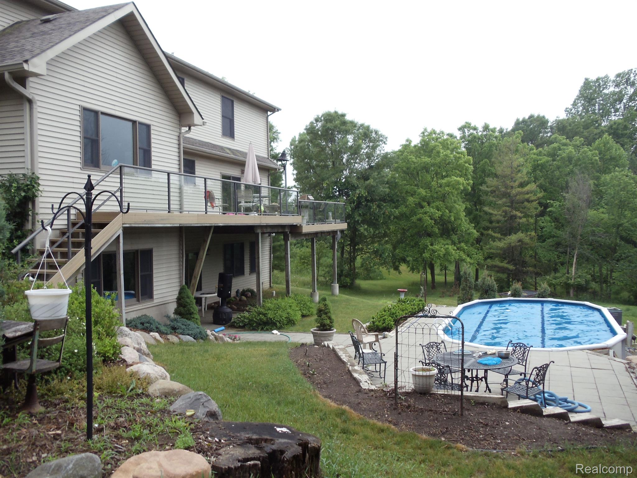 200 Duke Road Metamora, MI 48455 - Photo 2 of 17 View of pool and rear deck