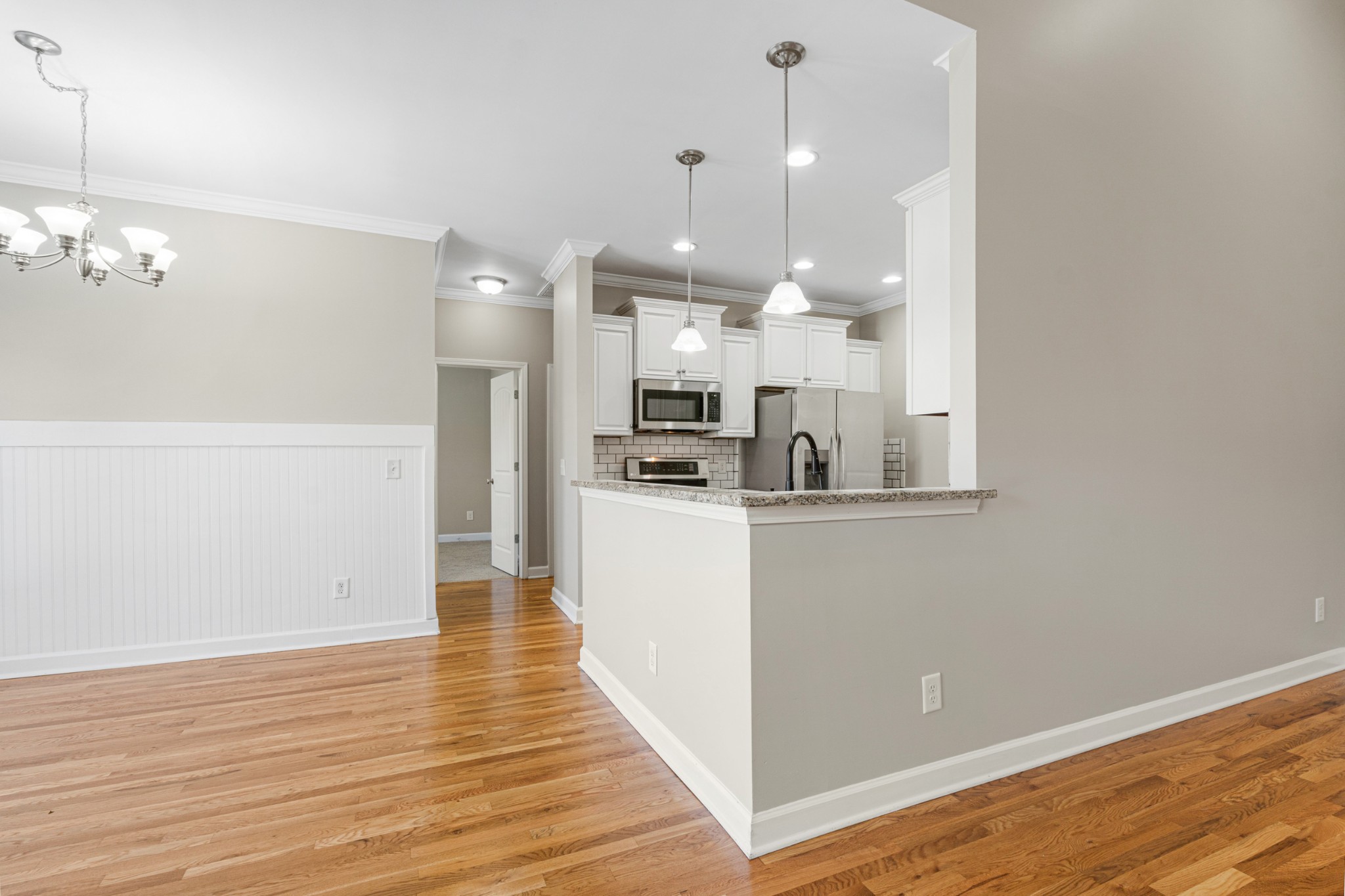 5007 Speight Street Spring Hill, TN 37174 - Photo 11 of 33 a view of kitchen and kitchen with wooden floor