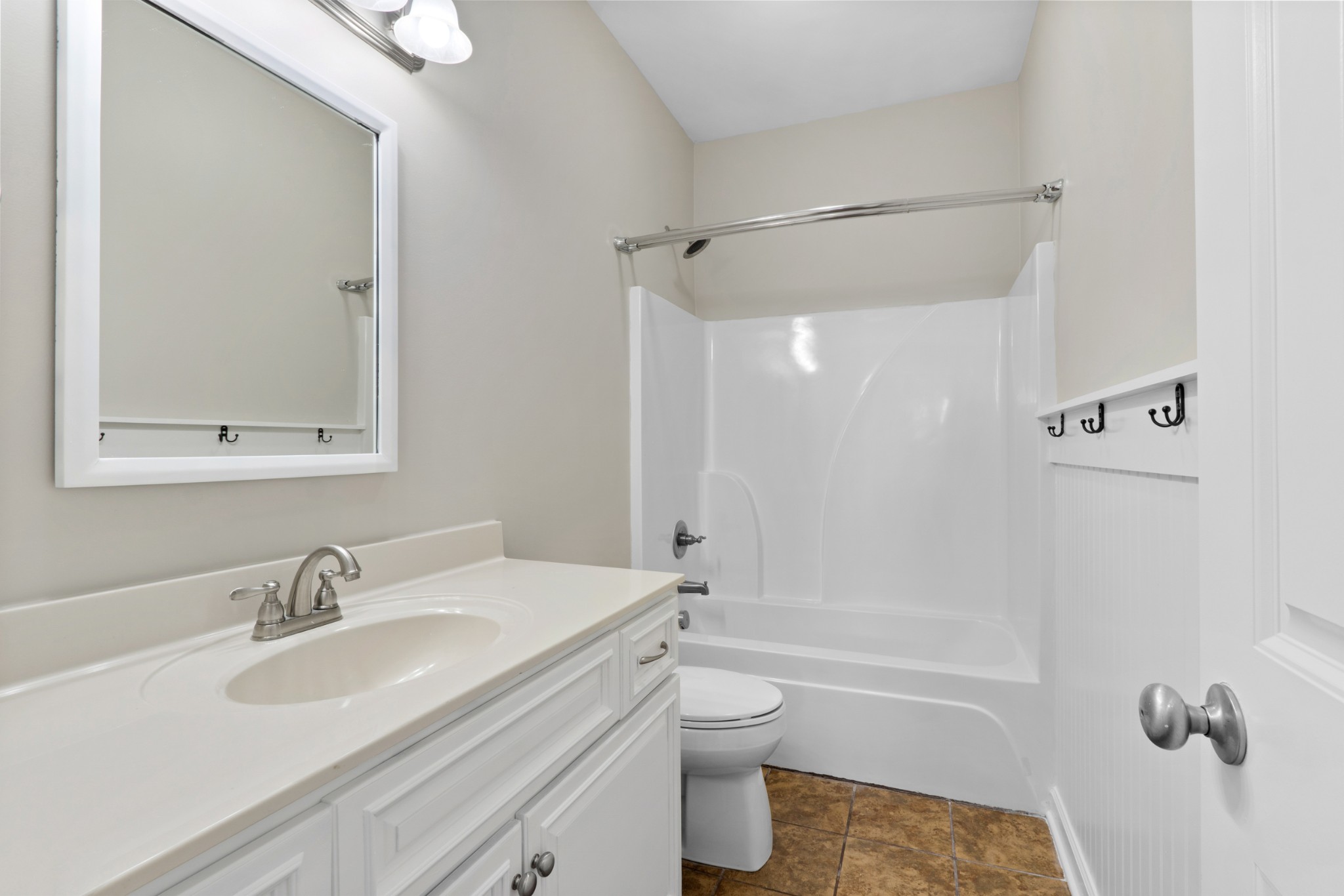 5007 Speight Street Spring Hill, TN 37174 - Photo 12 of 33 a bathroom with a granite countertop sink toilet and shower