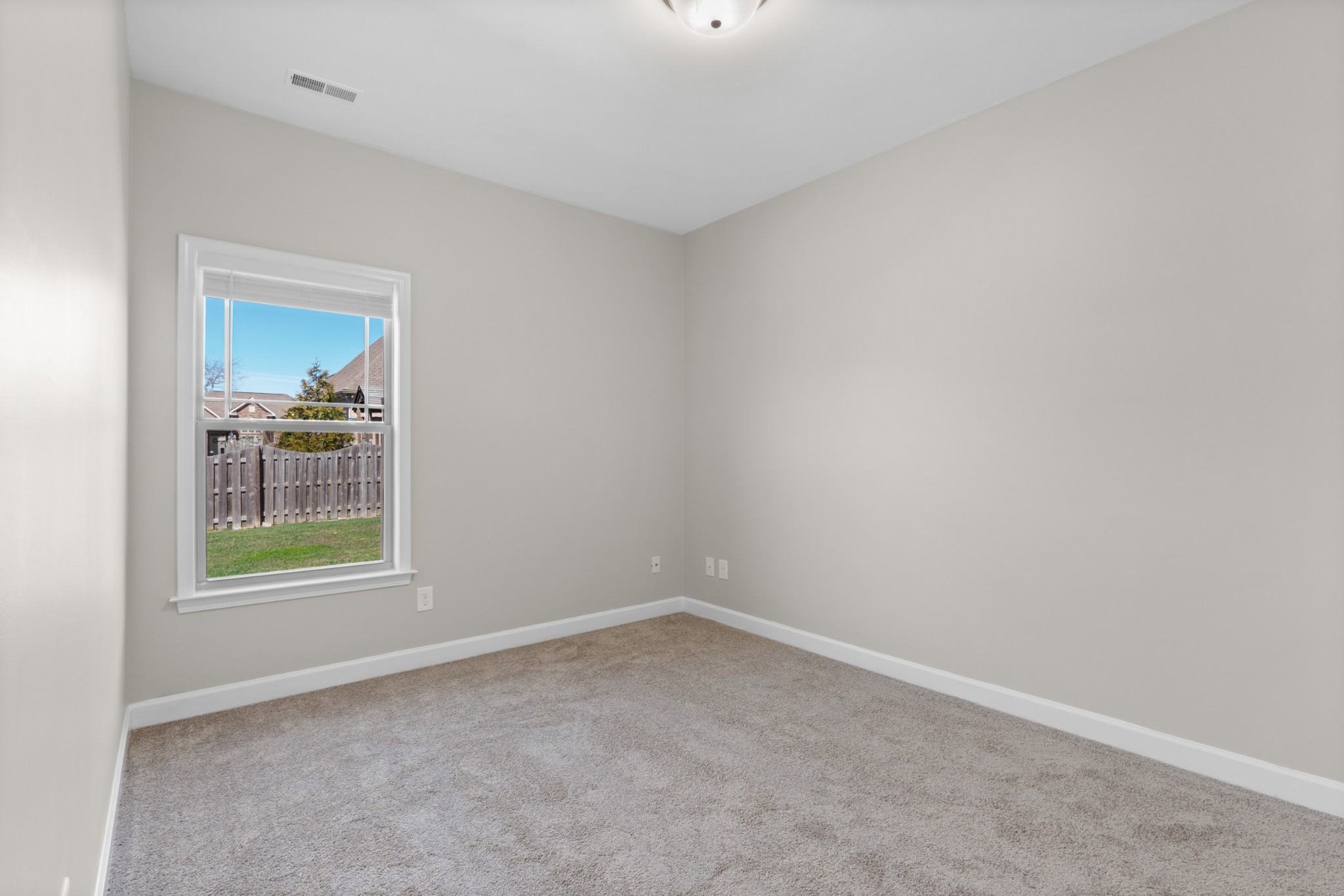 5007 Speight Street Spring Hill, TN 37174 - Photo 19 of 33 an empty room with a window