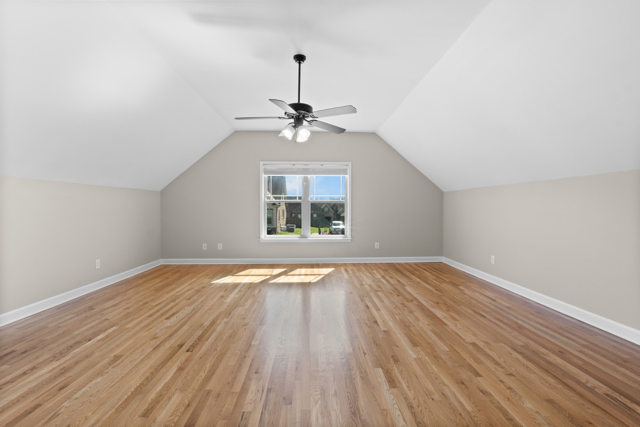 5007 Speight Street Spring Hill, TN 37174 - Photo 21 of 33 wooden floor in an empty room with a window