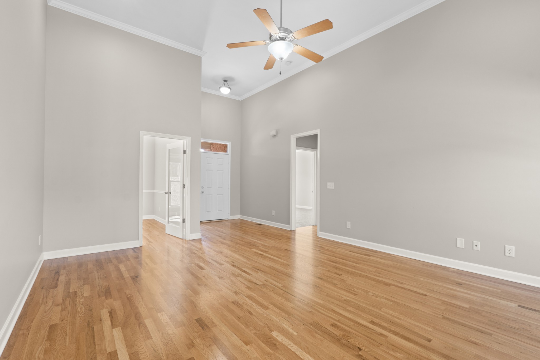 5007 Speight Street Spring Hill, TN 37174 - Photo 4 of 33 a view of an empty room with wooden floor