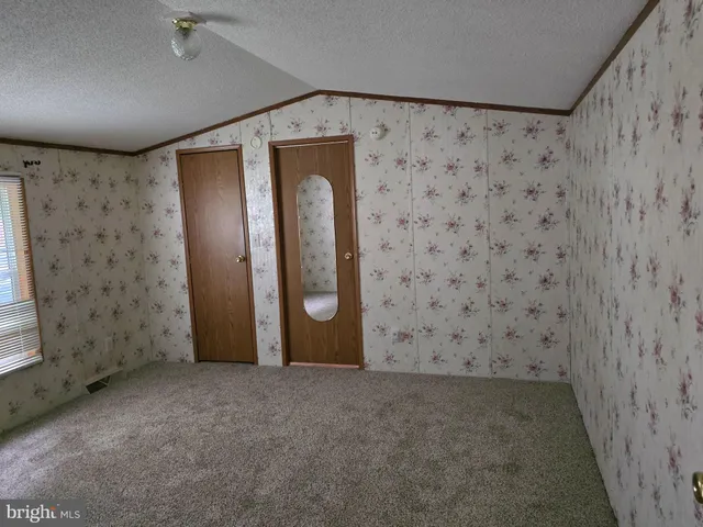 a view of a livingroom with a door