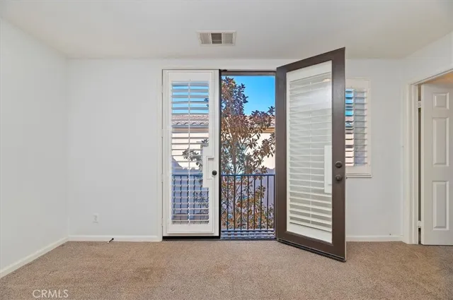 a view of a room with rack on the wall