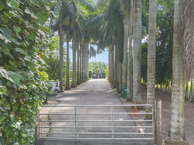a view of a dinning table and chairs in the room