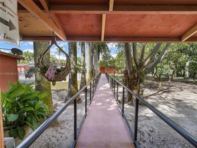 a house with trees in the background