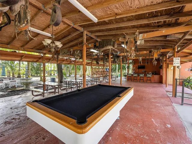 a view of a tree in front of a house