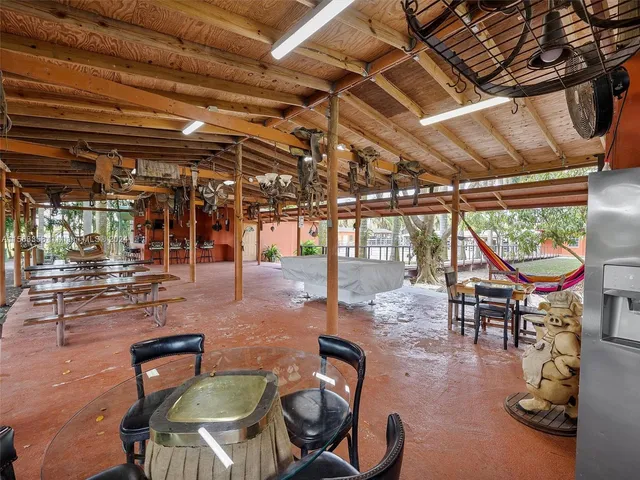 a view of a garden with a building in the background