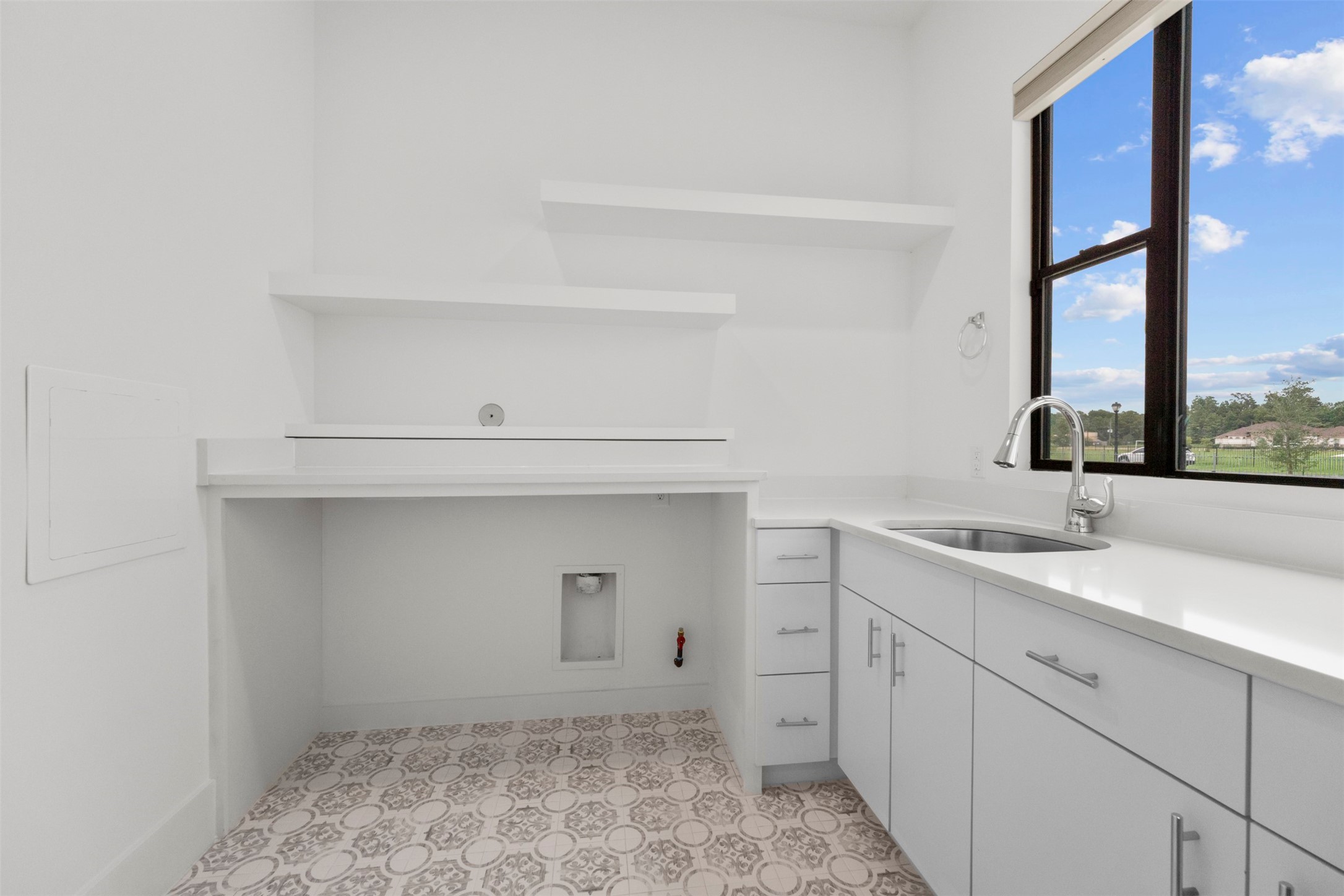 3932 Windsor Mist Lane Spring, TX 77386 - Photo 42 of 50 Laundry room with sink and tons of storage.