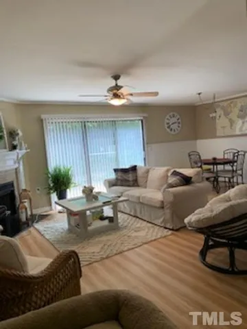 a living room with furniture and a table