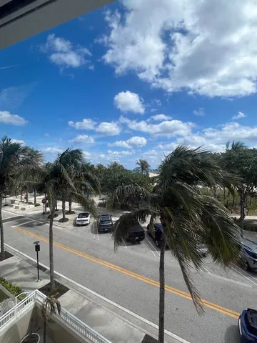 a view of city street with cars