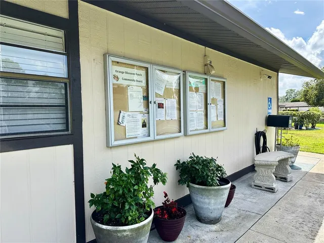 a view of outdoor space swimming pool and outdoor seating