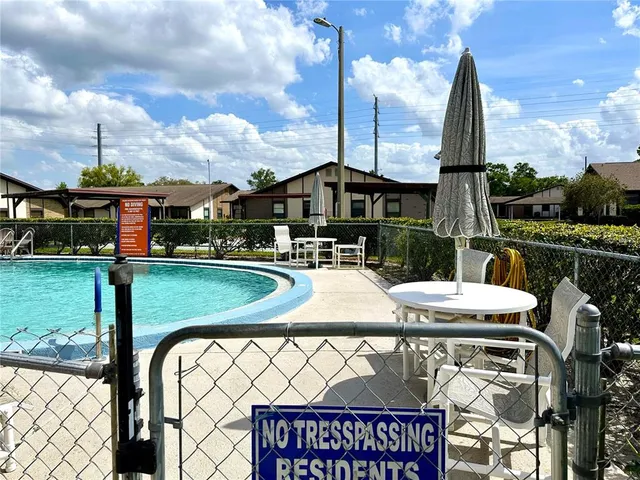 a view of a house with swimming pool