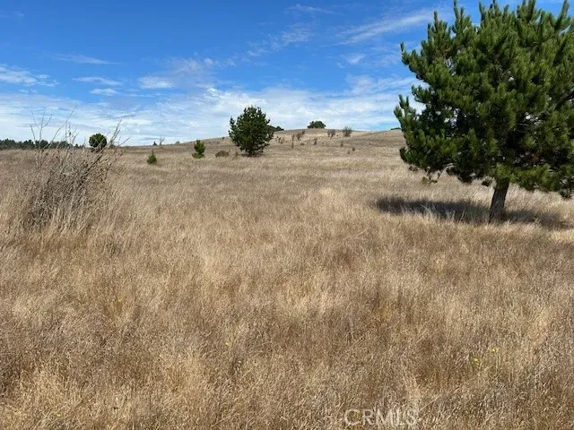 an aerial view of mountain with beach